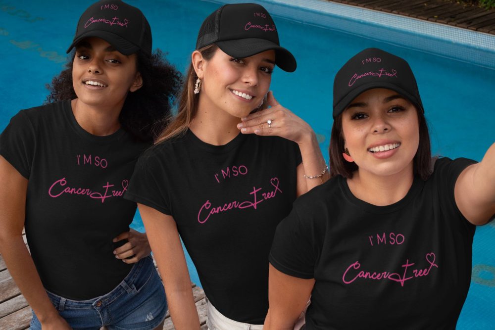 mockup cancer free tee 3 young women w-matching-trucker-hats